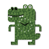 A green alligator clock with numbers on it's face.