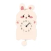 A white rabbit clock with pink ears and hands.