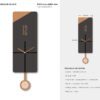 A clock that is made of wood and has the numbers 1 2 on it.